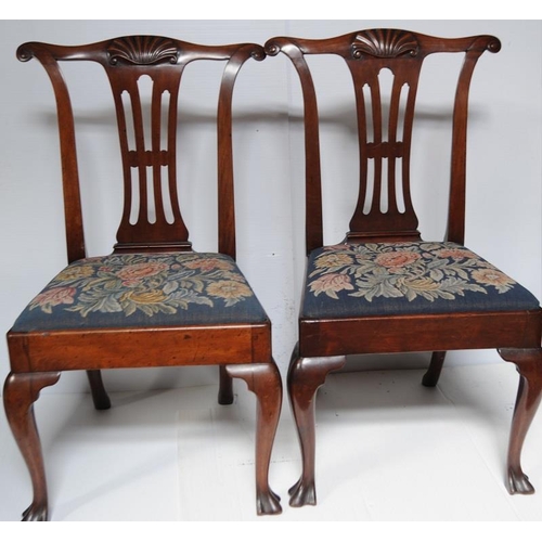 94 - Pair of Irish Georgian Mahogany Side Chairs with Scallop Motif on web feet.