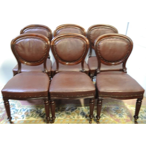 85 - Set of Six Victorian Mahogany Balloon backed hide upholstered Dining room Chairs on reeded and sabre... 