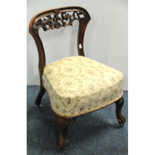 86 - Victorian walnut upholstered Nursing Chair on cabriole legs.