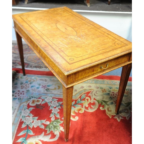 96 - Regency satinwood inlaid and crossbanded Hall/Writing Table fitted with two drawers on tapered legs.