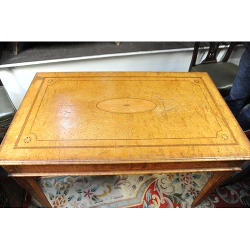 96 - Regency satinwood inlaid and crossbanded Hall/Writing Table fitted with two drawers on tapered legs.