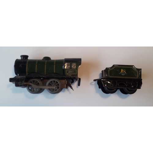 194 - Hornby clockwork ‘O’ Gauge locomotive and tender, playworn but working