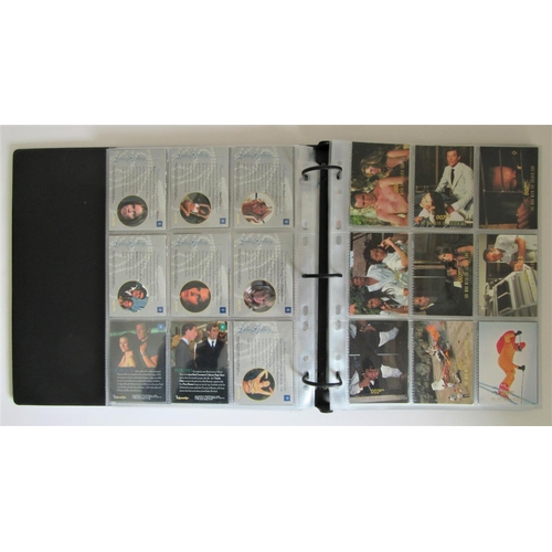 247 - JAMES BOND TRADING CARDS a large quantity to include 2 collector folders, one other folder and many ... 