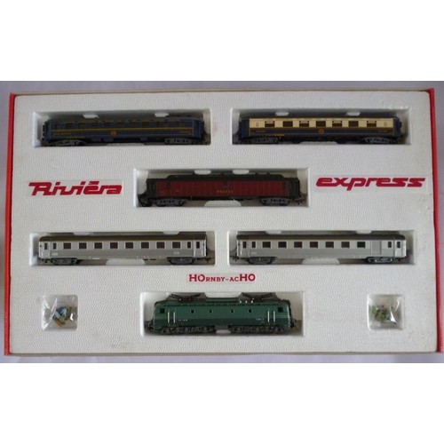 HORNBY-ACHO (Meccano-Triang) 6107 Riviera Express boxed set (rare), to include CC7121 Electric Loco, coaches, figures, track, transformer, etc. Excellent to Mint with minor wear to box.