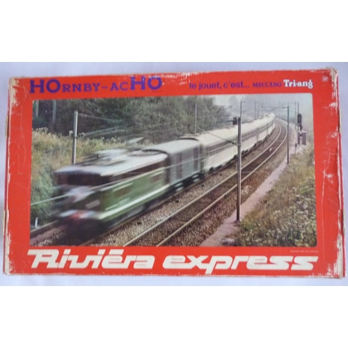 HORNBY-ACHO (Meccano-Triang) 6108 Riviera Express boxed set (very rare), to include CC7121 Electric Loco, Tee coaches x5 (4 have lights fitted – 1 unlit but has lighting kit included), plus track, transformer, etc. Excellent to Mint with wear to box edges.