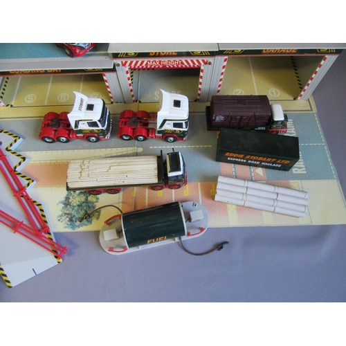 196 - CORGI ‘EDDIE STOBART’ MEGA DEPOT plus 5 unboxed vehicles. Good to Excellent, unboxed. £20-40