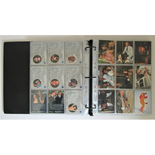 227 - JAMES BOND TRADING CARDS a large quantity to include 2 collector folders, one other folder and many ... 