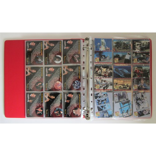 227 - JAMES BOND TRADING CARDS a large quantity to include 2 collector folders, one other folder and many ... 