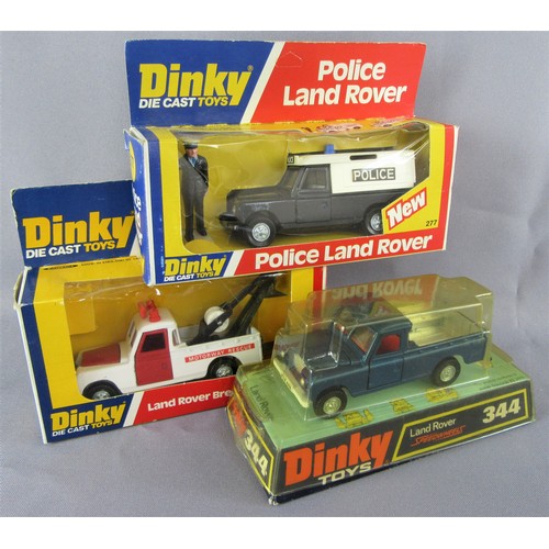 239 - DINKY TOYS 277 Police Land Rover, 442 Land Rover Breakdown Vehicle (red interior) and 344 Land Rover... 