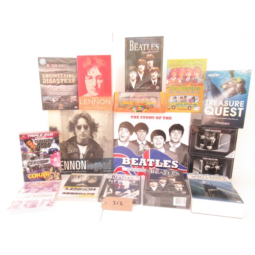 312 - Beatles Memorabilia to include books, Mugs and DVD`s all as new. Also includes non-Beatles DVD`s.