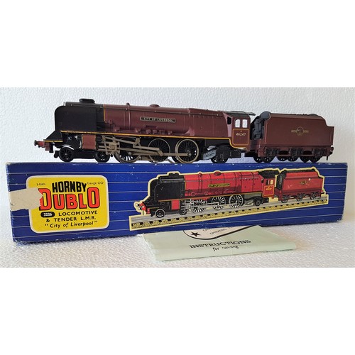 HORNBY-DUBLO 3-Rail 3226 ‘City of Liverpool’ Loco & Tender (with Caledonian Headboard). Minor paint chips. Good Plus in a Very Good to Excellent Box (marks on end where tape removed) with instructions.