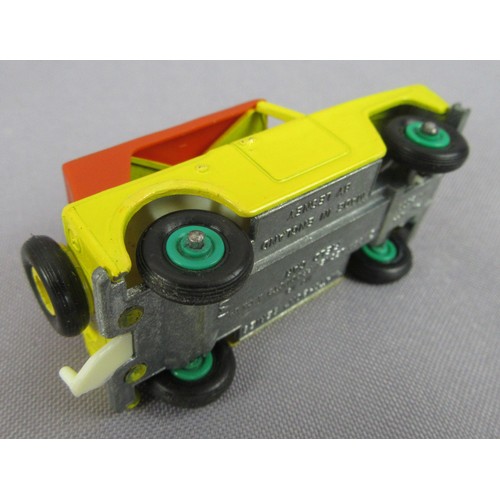 325 - MATCHBOX 1-75 18e Field Car, 2 examples, 1 with red hubs, 1 with green hubs. Near Mint in Good Plus ... 