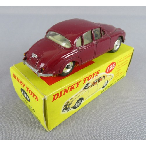 255 - DINKY TOYS 195 Jaguar 3.4 Saloon in Maroon. Near Mint in a Near Mint Box.