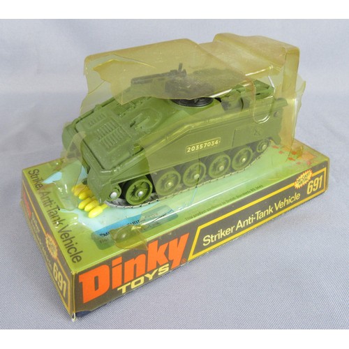 261 - DINKY TOYS 682 Stalwart Load Carrier, 691 Striker Anti-Tank Vehicle (damaged bubble pack), 699 Leopa... 