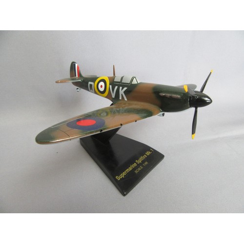 291 - SUPERMARINE SPITFIRE QVK P9386 on stand, 1:48th scale plus smaller scale World War II bomber on disp... 