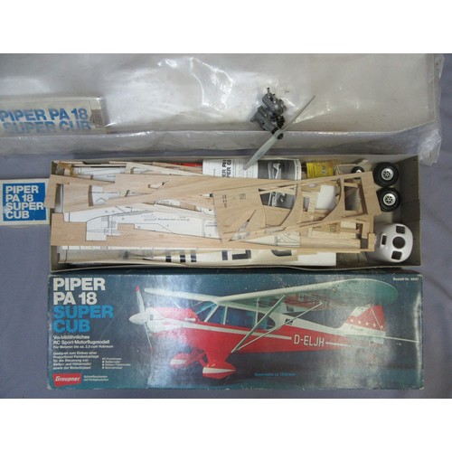 302 - GRAUPNER Piper PA-18 Super Cub Model Aircraft. Contents unchecked for completeness.