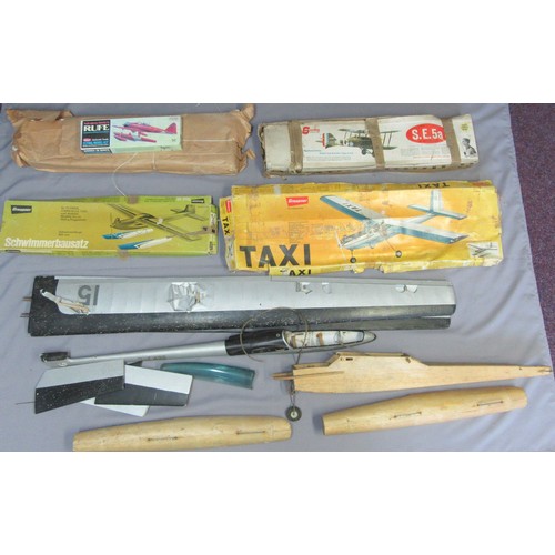 303 - GRAUPNER MODEL AIRCRAFT KITS, all unchecked for completeness, together with other related items.