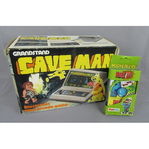 17 - GRANDSTAND ‘CAVE MAN’ Electronic Mini arcade game. Excellent (appears unused) in original box with i... 
