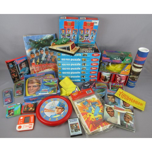 313 - THUNDERBIRDS assorted related items to include books, wall clock, towel, games, mugs, mobile phone c... 