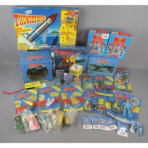 314 - THUNDERBIRDS assorted items to include loose and carded models, pin badges, Thunderbird 2 Battery Op... 