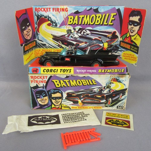 125 - CORGI 267 BATMOBILE in black with original leaflet and missiles. Near Mint Plus on a Near Mint Picto... 