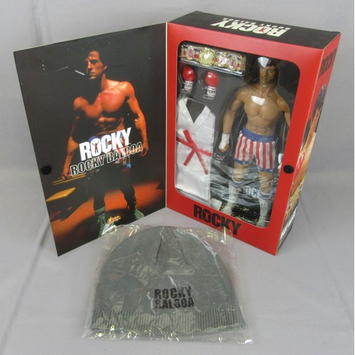 128 - HOT TOYS MMS19 ROCKY BALBOA 12’’ action figure. Mint in a Very Near Mint Box plus embroidered beanie... 