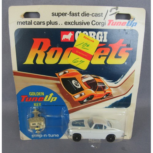 180 - CORGI ROCKETS D905 ‘The Saint’ Volvo P1800. Very Near Mint on a Near Mint (factory sealed) Card.