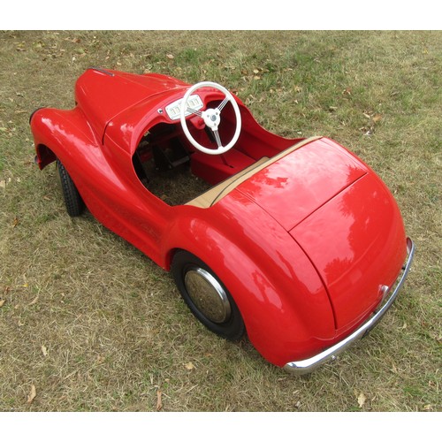 200 - AUSTIN J40 PEDAL CAR – Restored to an excellent standard in red with tan upholstery, plus accessorie... 