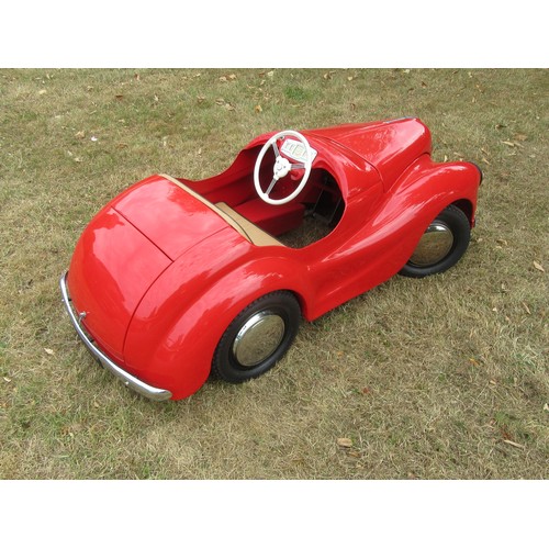 200 - AUSTIN J40 PEDAL CAR – Restored to an excellent standard in red with tan upholstery, plus accessorie... 