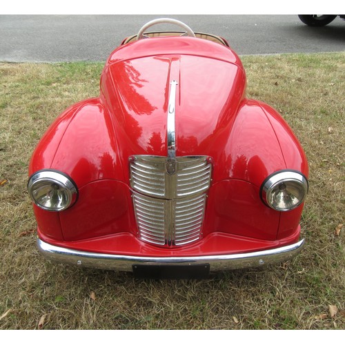 200 - AUSTIN J40 PEDAL CAR – Restored to an excellent standard in red with tan upholstery, plus accessorie... 