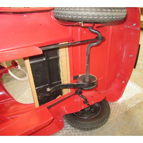 200 - AUSTIN J40 PEDAL CAR – Restored to an excellent standard in red with tan upholstery, plus accessorie... 