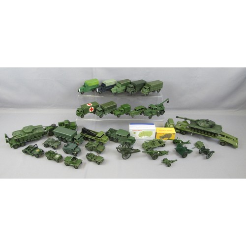 324 - DINKY TOYS Military/Army models. Very Good to Repainted, with 2 reproduction boxes. (32)