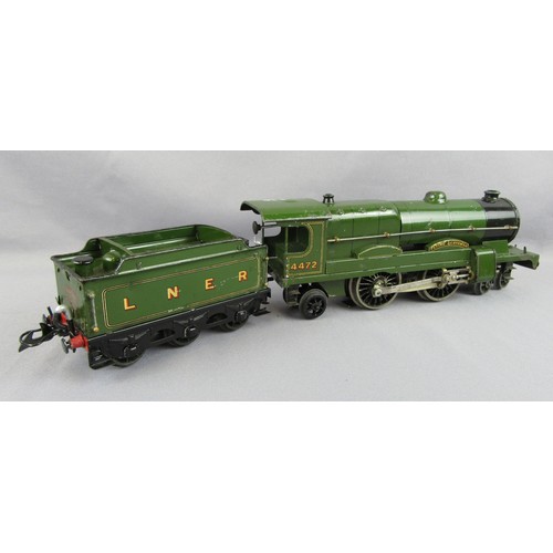 528 - HORNBY 0 Gauge 20volt Electric 4-4-2 Locomotive with 6-wheel tender LNER No 4472 lined green. Good, ... 