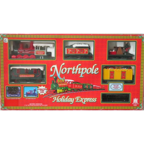 167 - NORTH POLE EXPRESS TRAIN SET Battery Operated (plastic construction) containing: Loco and Tender and... 