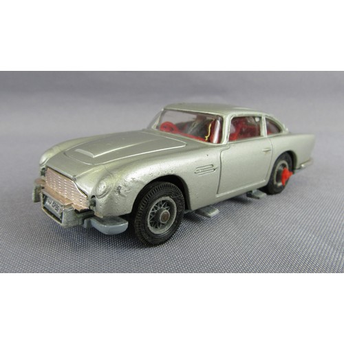 261 - CORGI TOYS 270 James Bond Aston Martin DB5. Good with damage to front bumper, working functions, ins... 