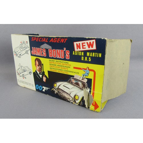 261 - CORGI TOYS 270 James Bond Aston Martin DB5. Good with damage to front bumper, working functions, ins... 