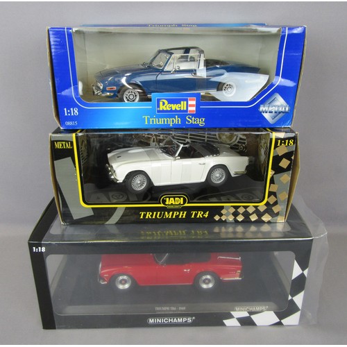 61 - TRIUMPH 1/18 models to include Minichamps 1969 Triumph TR6, Jadi Triumph TR4 and Revell Triumph Stag... 