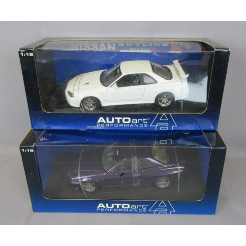 78 - AUTOART 1/18 Nissan Skyline R34 GT-R (V-spec) and Skyline R34 GT-R. Mint in Near Mint Boxes. (2)