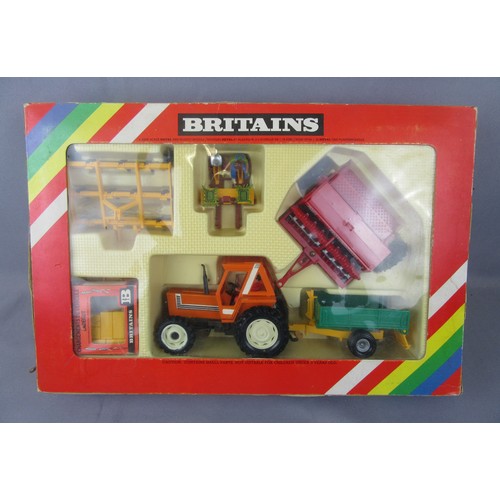 597 - BRITAINS 9591 Fiat Tractor and Implement Set, plus 9554 Gang Roller. Near Mint in Good Boxes.