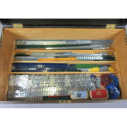 102 - MECCANO OUTFIT No.10 in wooden case, with two lift out fitted trays, contents not checked but not th... 