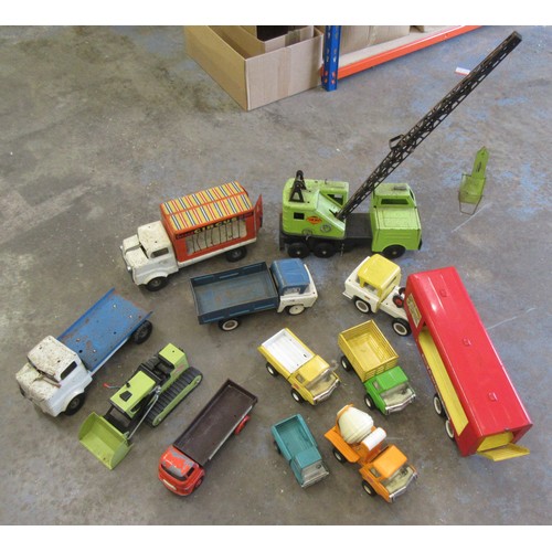 241 - TRI-ANG / TONKA pressed steel/tinplate to include circus vehicles and crane. Fair to Good. (11)