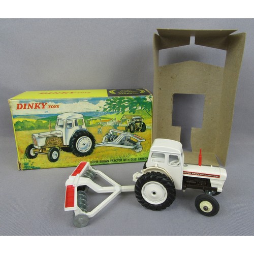 446 - DINKY TOYS 325 David Brown Tractor with Disc Harrow. Very Near Mint in a Near Mint Box with inner tr... 