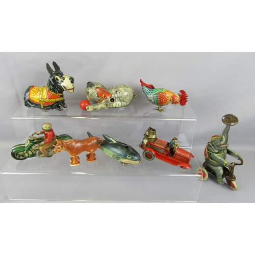 424 - TINPLATE CLOCKWORK TOYS to include Marx ‘Wee Scottie’ Dog, Kitten with ball, Cockrell, Elephant on T... 