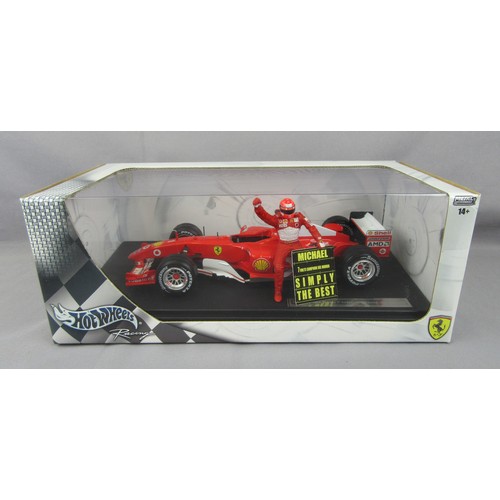 2 - HOT WHEELS 1:18 Formula 1, Ferrari F2004, Michael Schumacher ‘7 Times World Champion’ with figure ho... 