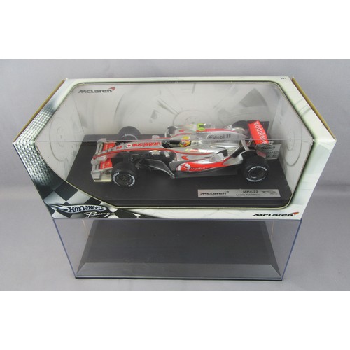 4 - HOT WHEELS 1:18 Formula 1, McLaren Mercedes MP4-22, Lewis Hamilton (K6634). Mint in Near Mint Plus B... 