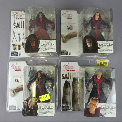 58 - NECA CULT CLASSICS ‘SAW’ 4x Jigsaw Killer figures (2x Hall of Fame, 2x Series 5). Unopened Near Mint... 