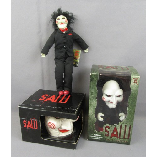 62 - NECA / REEL TOYS 9” Plush ‘SAW’ Billy the Puppet Doll with original tag attached, Mezcotoyz Billy th... 