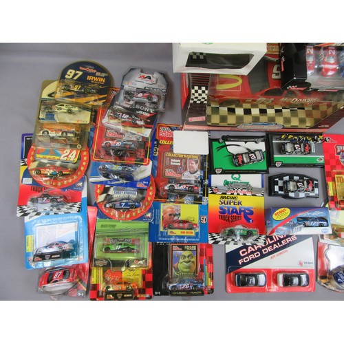 588 - NASCAR, mixed lot of mostly cards cars, plus 1:24 and 1:18 examples. Mint in Good to Mint Packaging.... 