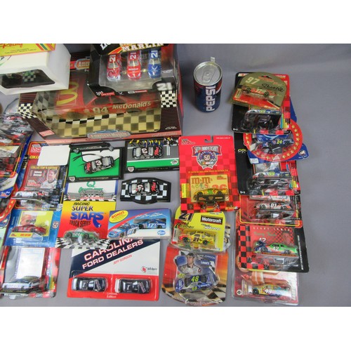 588 - NASCAR, mixed lot of mostly cards cars, plus 1:24 and 1:18 examples. Mint in Good to Mint Packaging.... 