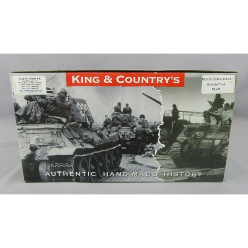 122 - KING & COUNTRY’S “Battle of the Bulge” BBA-30 M3A2 Half Track. Appears Mint in an Excellent Box.